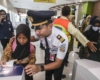 Pecahkan Rekor MURI, Ribuan Pelajar Serentak Naik Commuter Line
