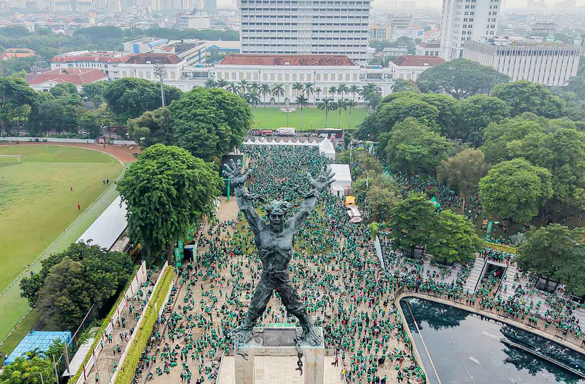 Monas Jadi Lautan Hijau, Ribuan Pelari Padati Jakarta International 10K