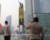 Bentangkan Spanduk Raksasa, Greenpeace Singgung Krisis Iklim dan Biaya Hidup